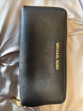 Michael Kors Black Zip-Around Saffiano Wallet with Gold Logo